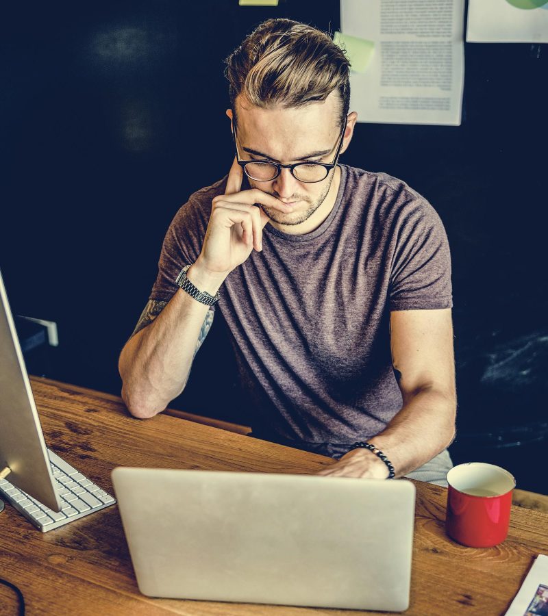 man-busy-photographer-editing-home-office-concept-PWSESWA.jpg